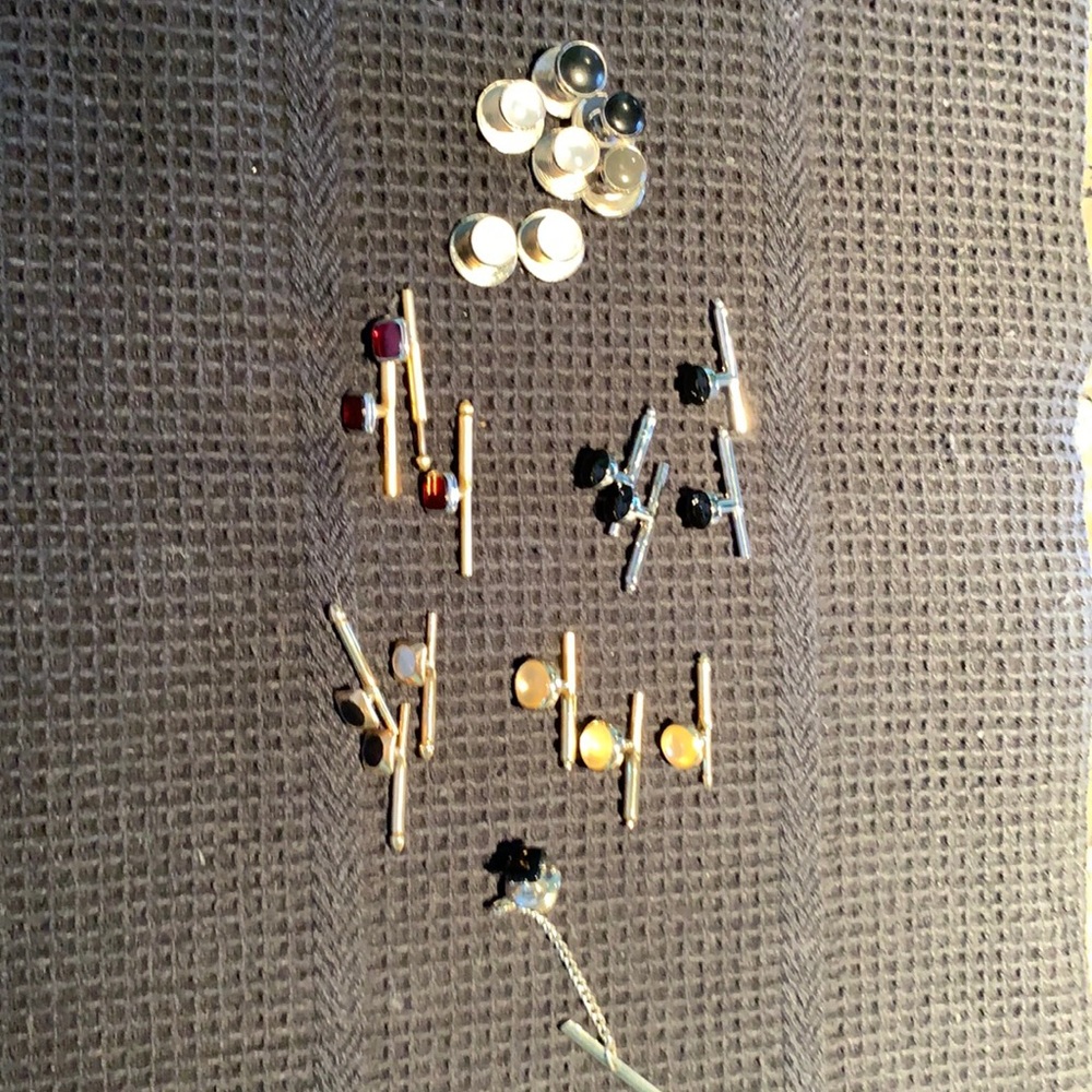 Tuxedo buttons and one black stone tie tack